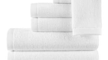 White textured bath towels stacked